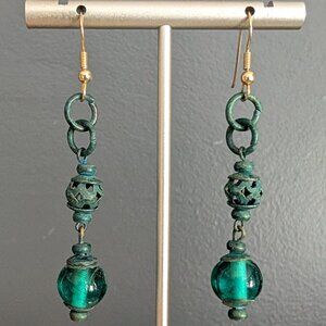 Green glass and patina metal dangle earrings